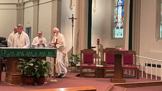 msgr. liddy celebrating mass