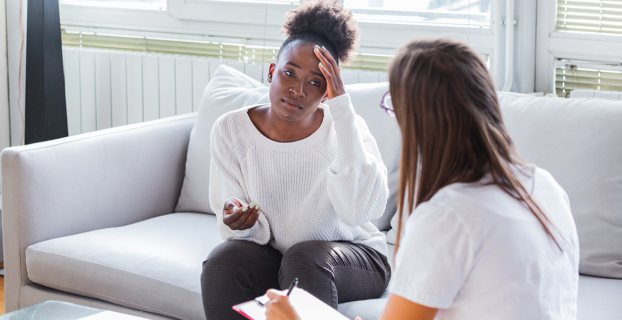 Image of a professional counselor with a patient.