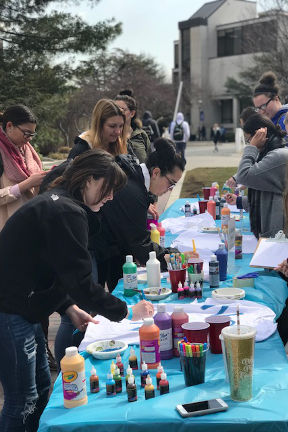 Students making crafts on a table