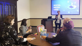 Women Speaking at Workshop 