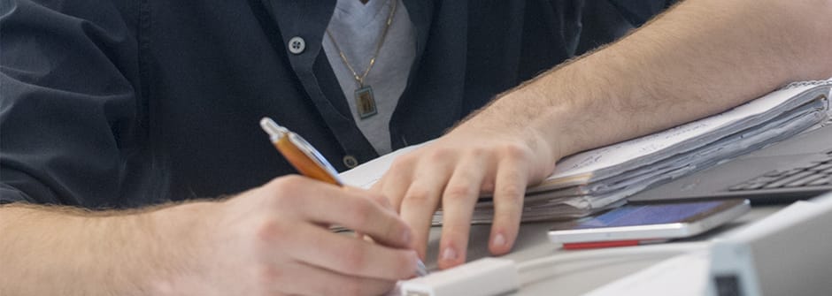 A Student Taking Notes