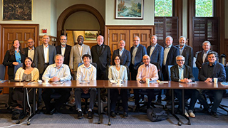 Group photo from the CIO Roundtable talks on AI governance