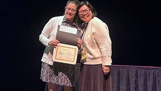 Andrea Hundley Receiving Award at NAFSA 