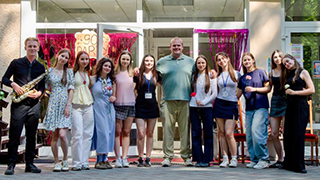 Misura with his class of students at UCU.