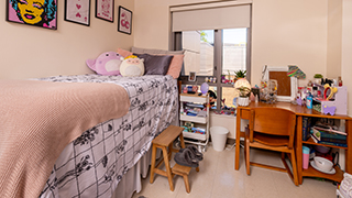 Image of a decorated bedroom in Aquinas. 