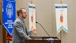Crable giving welcome speech