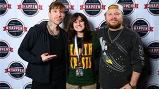 Cassidy Cauwels pictured with members of Shinedown