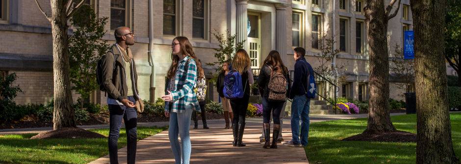 Students walking to class on campus 