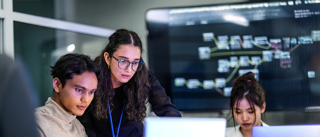 Computer engineers over laptop Computer engineers over laptop