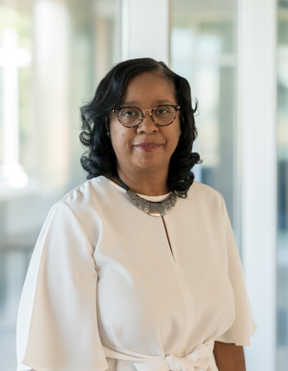 A headshot of SHU professor Dorothy Carolina