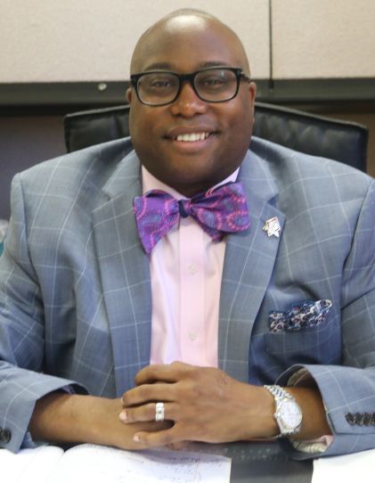A headshot of SHU graduate Gerald Fitzhugh
