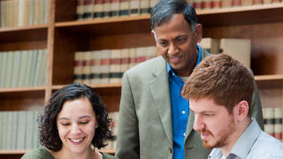 Faculty member with students Faculy member with students
