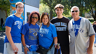 Image of a family enjoying Seton Hall's Homecoming Weekend 2025. 