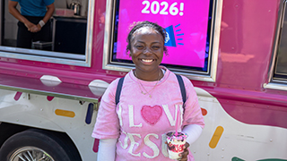 Student having ice scream at the scream truck.