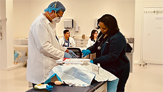 Nursing students in a lab 