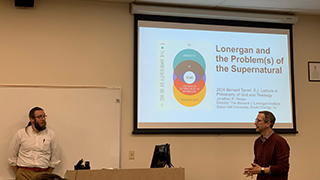 Jonathan Heaps, Ph.D., lecturing.