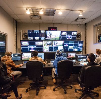 SHU MA Comm students working at a monitor