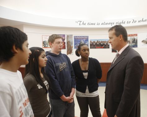 A SHU MA School Counseling professor chats with students