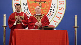 Image of the President leading mass