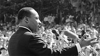 Dr. Martin Luther King Jr. delivering a speech
