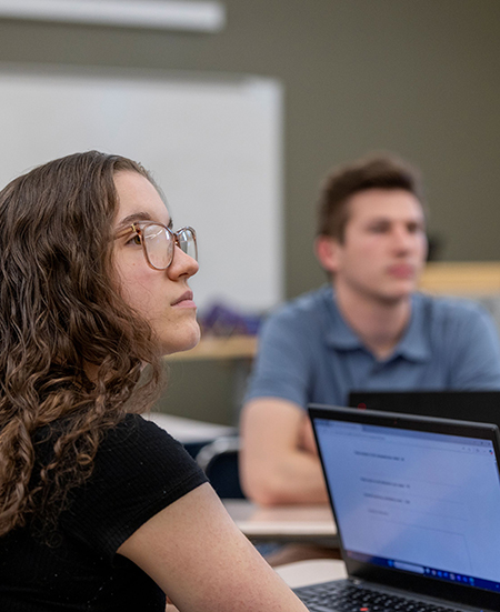 Students sitting in a classroom.