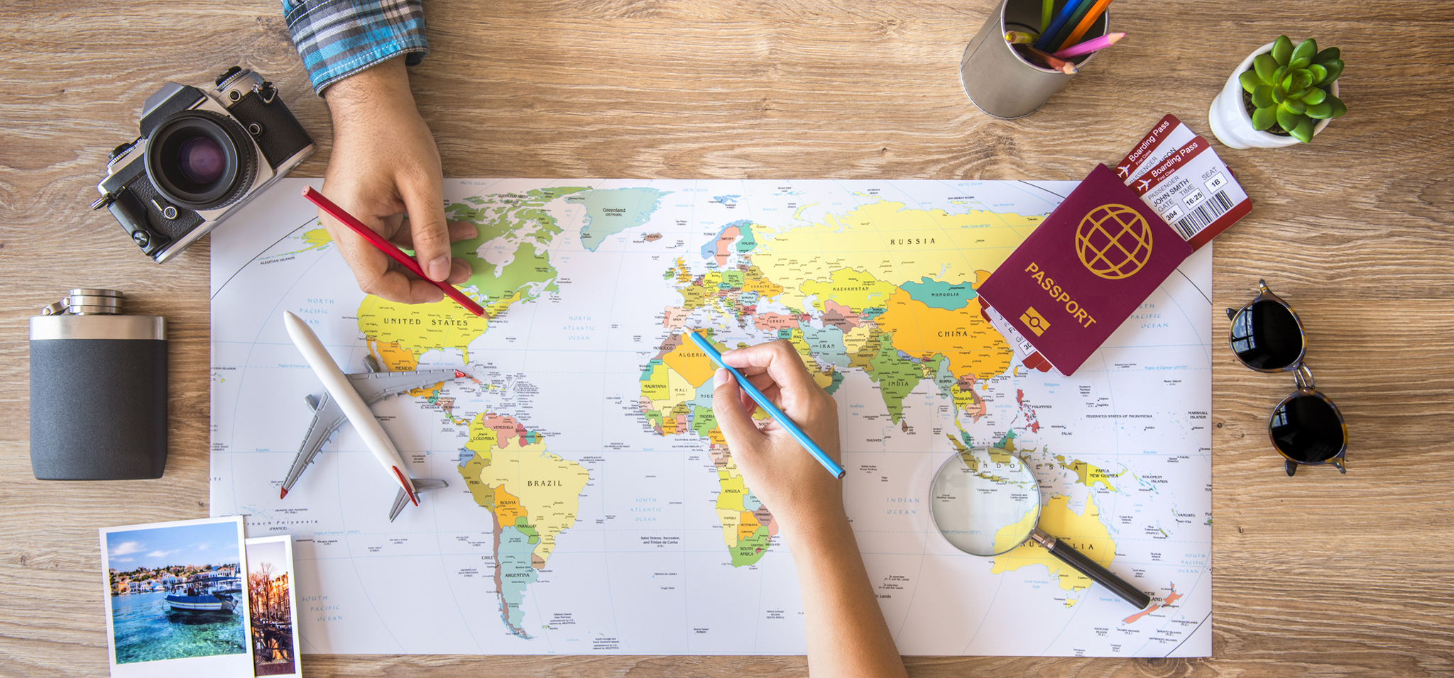 A couple with a map on a table planning a trip