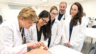 Nursing students learning at the immersion session.