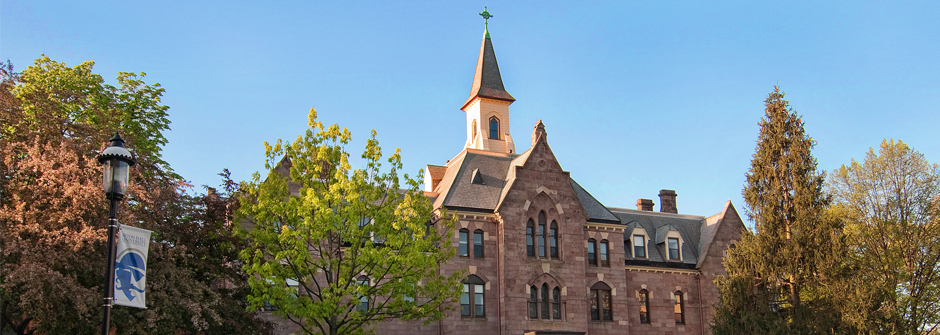 Image of President's Hall in the spring or summer. 