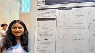 Student Reva Pavithran pictured at the Petersheim Symposium presenting research.