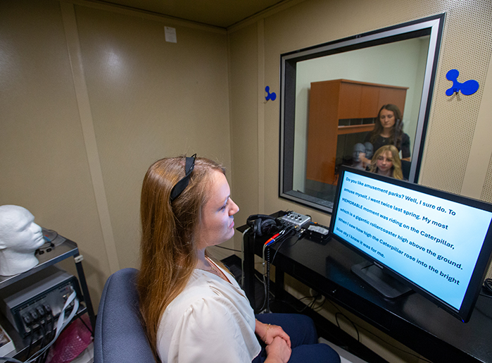 SLP student working in a lab