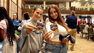 two student at the annual convocation event