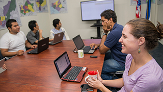 Students at table studying