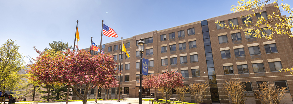 The Complex Exterior with Flag Poles Outside 