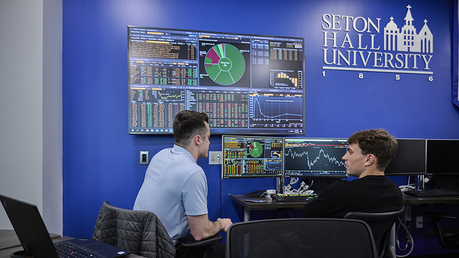 Students utilizing the renovated trading room