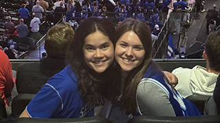 Two students taking a selfie at the Big East Conference