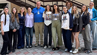 Andrew Misura with his class at Ukrainian Catholic University.