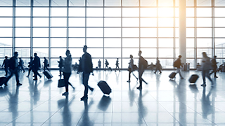 People walking at an airport.