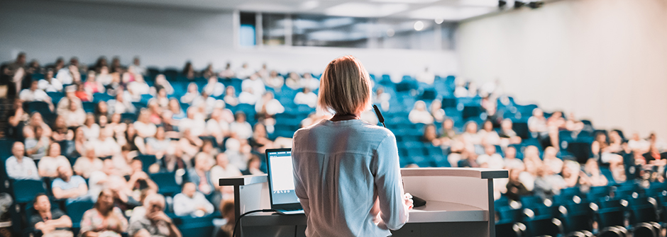 Women in leadership giving a presentation